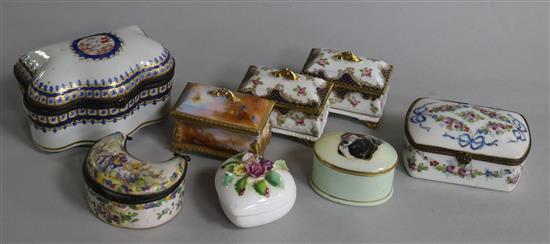 Eight ceramic boxes and covers